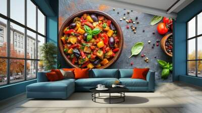 Vegetable stew, saute or caponata. Stewed eggplant with paprika, tomatoes, spices and herbs. White kitchen table background, top view, copy space Wall mural