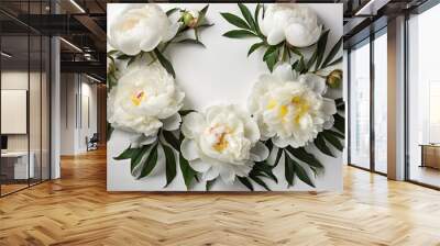 Flat lay spring floral composition. Top view wreath made of peonies flowers on white background Wall mural