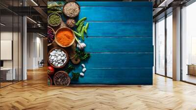 Legumes and vegetables on a plate on a wooden kitchen table. vegan style healthy vegetables.  Wall mural