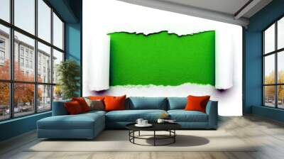 A hole in white paper with torn edges isolated on a white background with a bright green color paper background inside. Good paper texture Wall mural