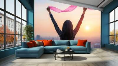 Triumph and Hope - Woman Celebrating Victory with Pink Ribbon Fluttering in Wide Open Landscape Background, Generative Ai Wall mural