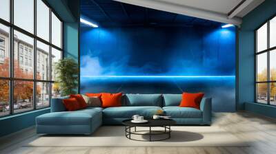 Empty underground parking lot, neon blue lights on the wall, smoke in space. Wall mural