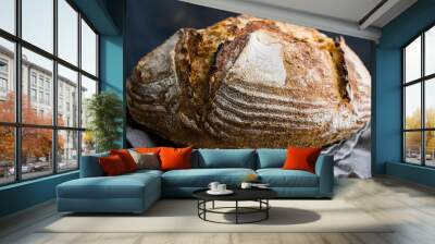 Freshly baked artisan bread. Tasty food. Homemade product. Cooking and culinary concept. Wall mural