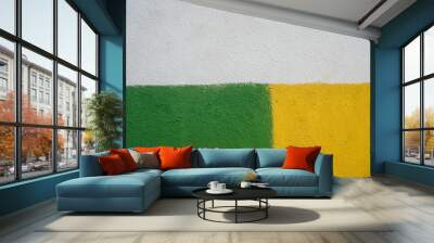 Textured wall with green, yellow and white paint. Abstract backdrop. Wall mural