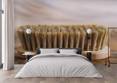 Wooden brush with brown bristles on table. Natural material. For cleaning or polishing shoe Wall mural