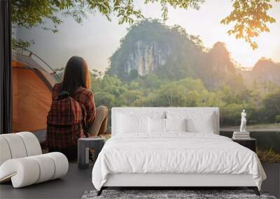 
Good morning. Asian woman traveling and camping alone at natural park in Thailand. Recreation and travel outdoor activity beautiful lifestyle Wall mural