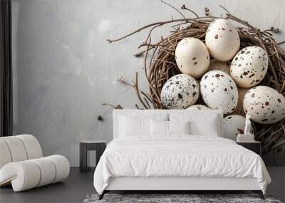 A group of speckled eggs arranged in a nest on a light gray background Wall mural