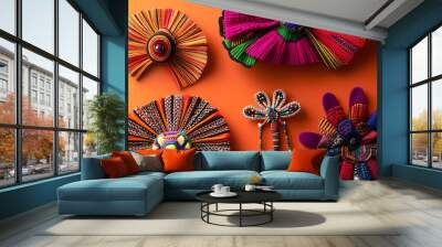 Colorful Textile Brooches Arranged on Orange Background Wall mural