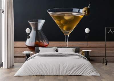 glass of martini with olive olives on a dark gray background Wall mural