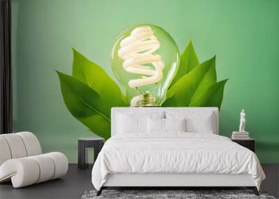 energy saving light bulb made with green leaves. Wall mural