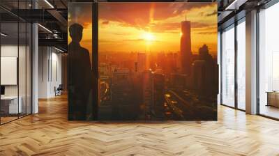 Urban sunset, businessman by window, business concept, panoramic city view. Wall mural