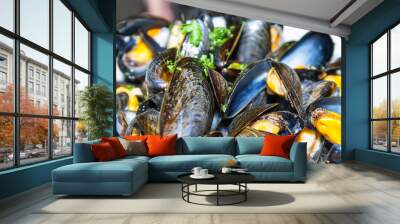 a bowl of delicious mussels with herbs Wall mural