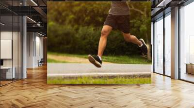 Young black runner man running on the street be exercise and workout in nature countryside road in the morning. Healthy body exercise sports concept. for banner website Wall mural