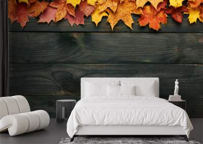 Wooden background with autumn leaves Wall mural