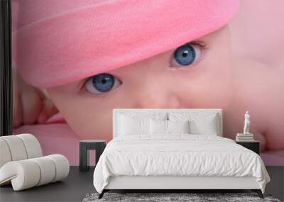 pink little baby girl with big eyes Wall mural