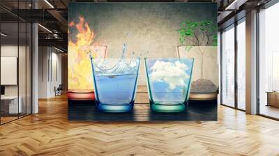 Four Elements of the nature in glasses isolated on gray Wall mural