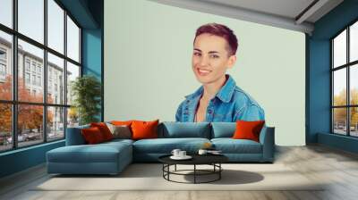 Success. Closeup portrait head shot confident beautiful happy young woman arms crossed smiling isolated green background wall. Positive human emotion face expression feeling life perception attitude Wall mural