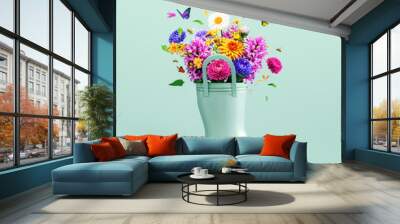 Green rubber boot full of colorful spring flowers with butterflies and bees on mint green background. Spring is here concept. 3D Rendering, 3D Illustration	 Wall mural