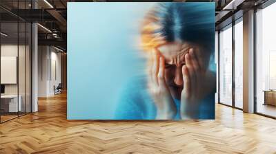 A blurred image depicting a person in distress, symbolizing anxiety and emotional turmoil in a captivating artistic style. Wall mural