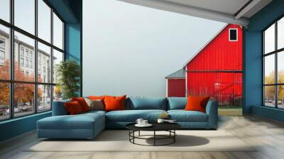 A vibrant red barn stands alone on a foggy field, creating a serene and peaceful rural landscape scene. Wall mural