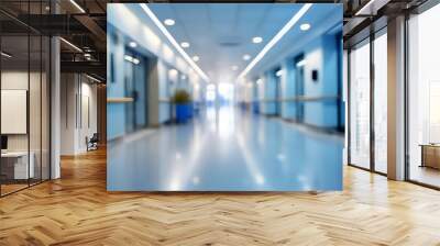 blurred of background. interior of a modern hospital with an empty long corridor, there are treatment rooms and waiting room for patients and families between the corridor with bright white lights. Wall mural