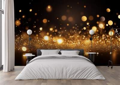 gold glow particles bokeh sparkle glittering on black background holiday christmas new year celebration Wall mural