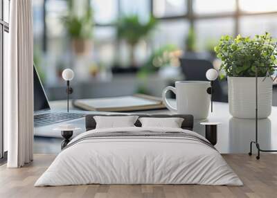 A white notebook on a white table Wall mural