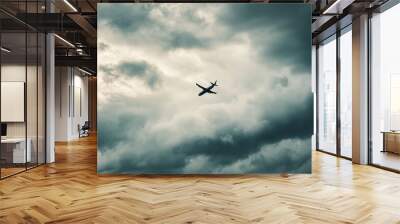 Airplane Flying Through Dark Clouds Wall mural