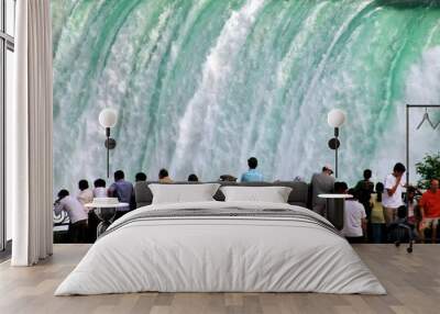 people on falling water background. niagara falls Wall mural