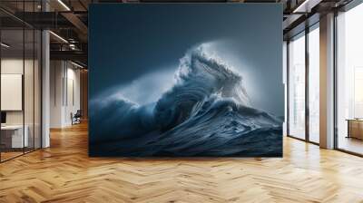 A massive wave rises high, its crest illuminated in a soft glow against the dark sky, revealing the dynamic force of the ocean in a breathtaking display of power and beauty Wall mural