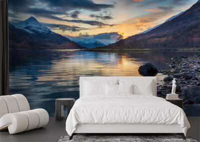 Beautiful sunset with snow capped mountains from the shores of Loch Leven Wall mural