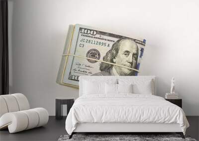 100 dollar bill roll isolated on white background. Wall mural