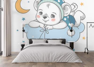 Vector illustration of a cute baby bear in blue nightwear, lying on the cloud among the stars. Wall mural