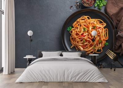 Traditional Italian pasta with tomatoes and fresh parsley. Top view, copy space. Wall mural