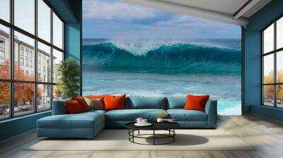 Beautiful ocean tube wave rolls towards the beach of an exotic island in Pacific Wall mural