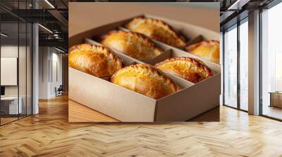 Empanadas pies on a light background. Delivery, takeaway, homemade food. Delivery  Wall mural