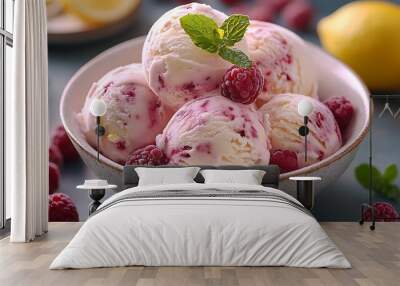 A bowl of vanilla ice cream with raspberries and lemon zest. Wall mural