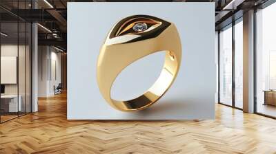 A gold ring with a diamond in the shape of an eye. Wall mural