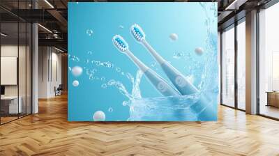 Two electric toothbrushes with blue bristles are submerged in a splash of water on a blue background. Wall mural