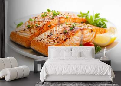 Two grilled salmon fillets served on a white plate with lemon wedges, cherry tomatoes, and parsley. Wall mural