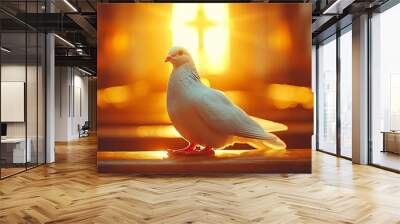 White dove perched on a ledge with a cross shaped window behind it. Wall mural