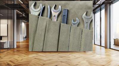 Wrenches in a fabric case and tools. Wall mural