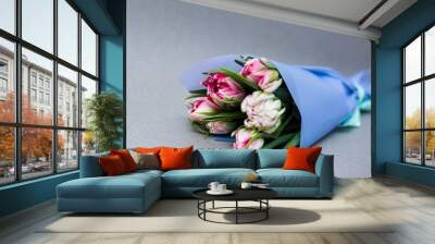 Beautiful tseti tulips on a light background Wall mural