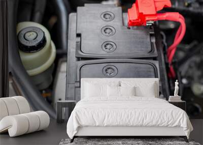 the battery in the car in the engine compartment, background, accumulator battery Wall mural