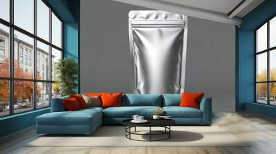 A blank silver foil pouch standing upright on a gray background. Wall mural