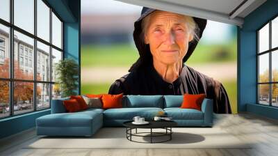 Elderly Amish woman, traditional attire, rural setting.
 Wall mural