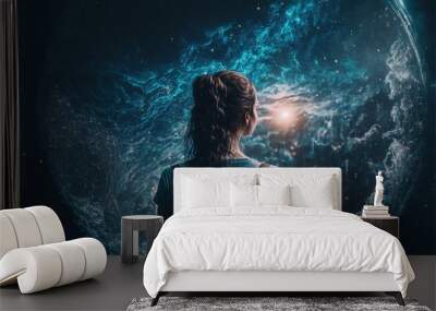 Back view of woman looking at water of the universe, concept art. Wall mural