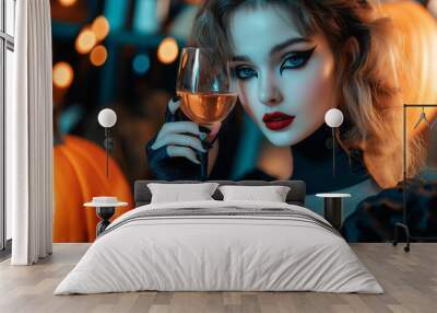 Fashion portrait Elegant Luxury Studio Shot of A cute  girl dressed Dracula costume drinks wine with wine stains on her mout Wall mural