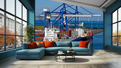 container ship and loading crane in port Wall mural