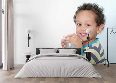 child drinking milk for breakfast on white background stock photo Wall mural